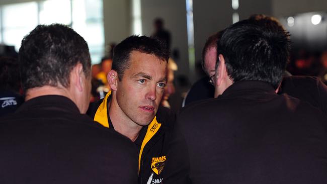 Alastair Clarkson, with Gary Buckenara on his left, discusses a selection back in 2008.