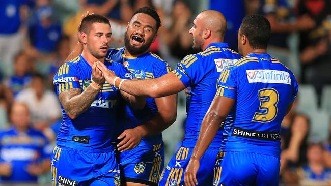Nathan Peats celebrates his try against the Cowboys. Picture: Mark Evans