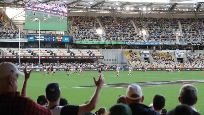 Supporters watch the Carlton Blues and the Collingwood Magpies at The Gabba yesterday. Picture: Getty Images