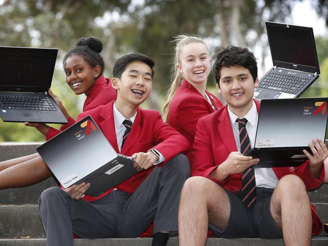 School Hub Chapter 3 showing a five year analysis of schools' NAPLAN scores. Auburn High School year 9 students Yomiyu 14, Thomas 15, Amy 15 and Alexi 15 who did their NAPLAN test online, celebrate their results.     Picture: David Caird