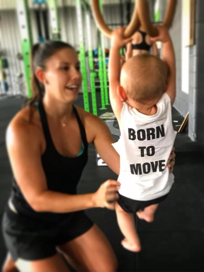 Ms Clarke at the gym with her son Trey. Picture: Supplied