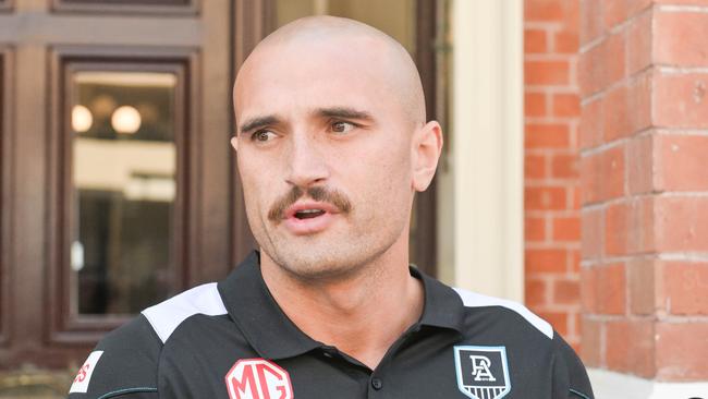 ADELAIDE, AUSTRALIA - NewsWire Photos FEBRUARY 28, 2024: Port Adelaide football player Sam Powell-Pepper outside his lawyers office after a tribunal hearing where he was charged with a high bump on Adelaide player Mark Keane. Picture: NCA NewsWire / Brenton Edwards