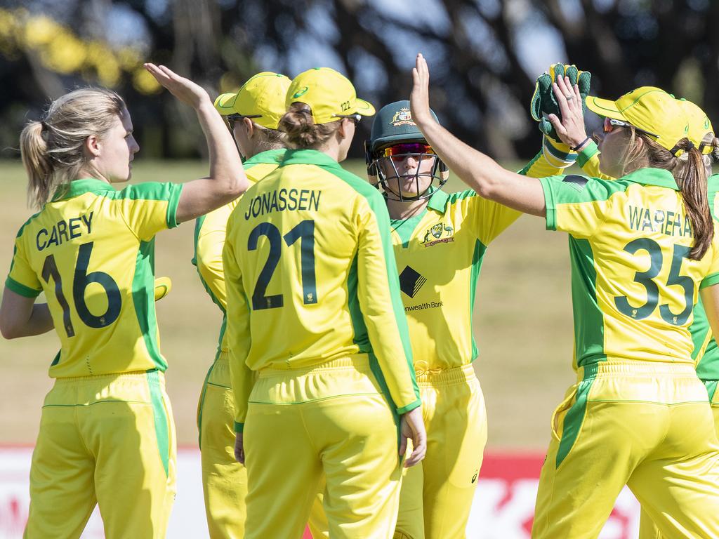 Australia celebrate their tenth wicket.