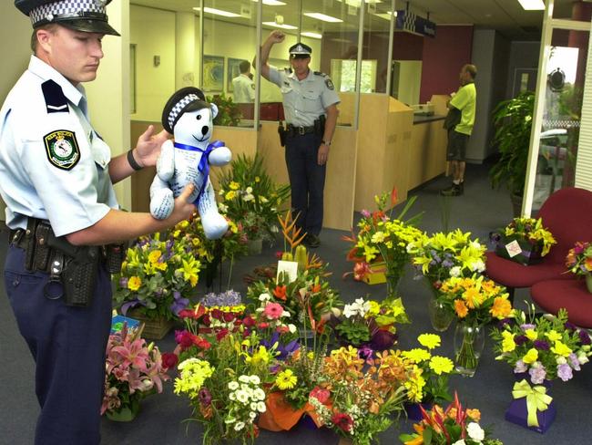 Tributes to slain officer Glenn McEnallay at Mascot police station. Picture: Frank Violi