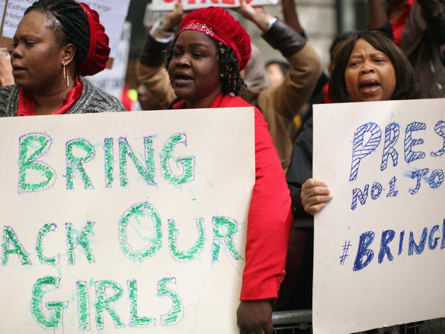 Protesters call for the release of a group of abducted Nigerian schoolgirls gather outside Nigeria House in London in May last year. Picture: AP