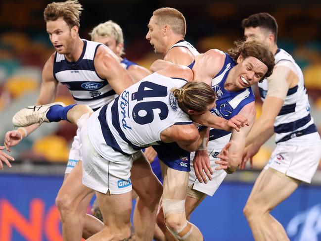 North Melbourne’s Ben Brown in the tackle that injured his leg. Picture: Michael Klein