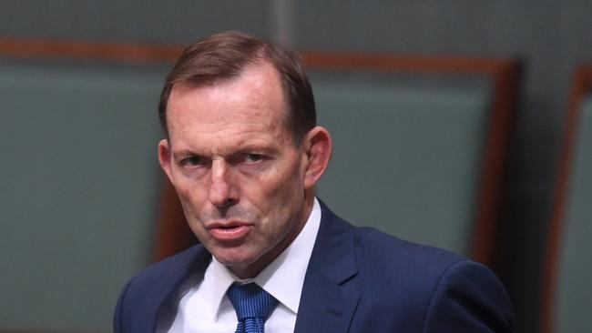 Former Australian prime minister Tony Abbott arrives during House of Representatives Question Time at Parliament House in Canberra, Tuesday, August 8, 2017.  (AAP Image/Lukas Coch) NO ARCHIVING