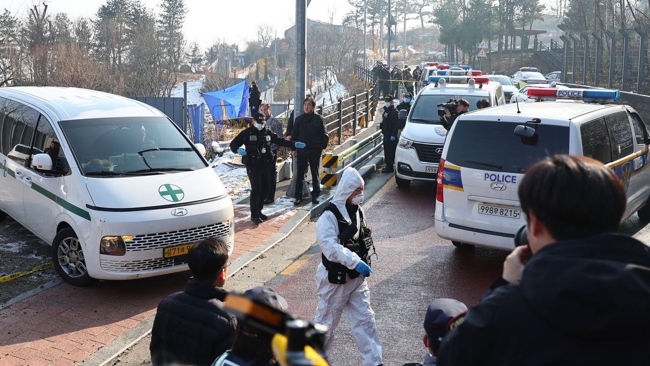 Police pictured at the scene. Picture: Yonhap / AFP