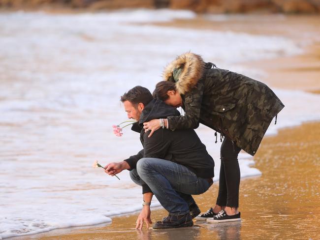 Family and friends were devastated at the vigil. Picture: John Grainger