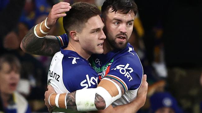 SYDNEY, AUSTRALIA - JULY 08: Luke Metcalf of the Warriors celebrates with team mates after scoring a try during the round 19 NRL match between Parramatta Eels and New Zealand Warriors at CommBank Stadium on July 08, 2023 in Sydney, Australia. (Photo by Matt Blyth/Getty Images)