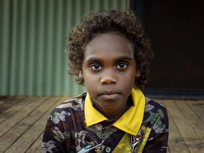 Anastias Pascoe outside the teachers' accommodation at Gamardi. Picture: Rebecca Parker