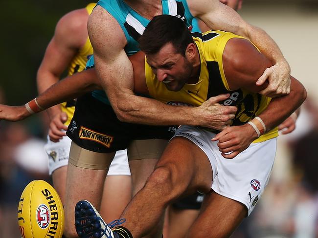 MOUNT GAMBIER, AUSTRALIA - MARCH 05: Toby Nankervis of the Tigers is tackled by Matthew Lobbe of the Power during the 2017 JLT Community Series AFL match between the Port Adelaide Power and the Richmond Tigers at Malseed Park on March 5, 2017 in Mount Gambier, Australia. (Photo by Morne de Klerk/Getty Images)