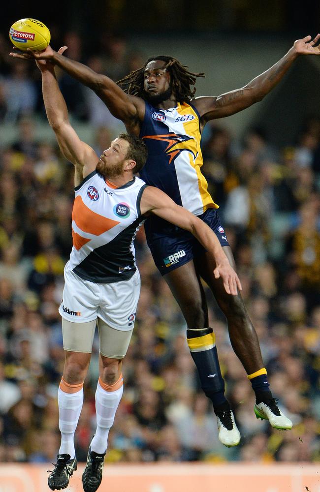 The battle between West Coast's Nic Naitanui and GWS Giant Shane Mumford will go a long way to determining the outcome of Saturday’s clash at Spotless Stadium. Picture: Daniel Wilkins