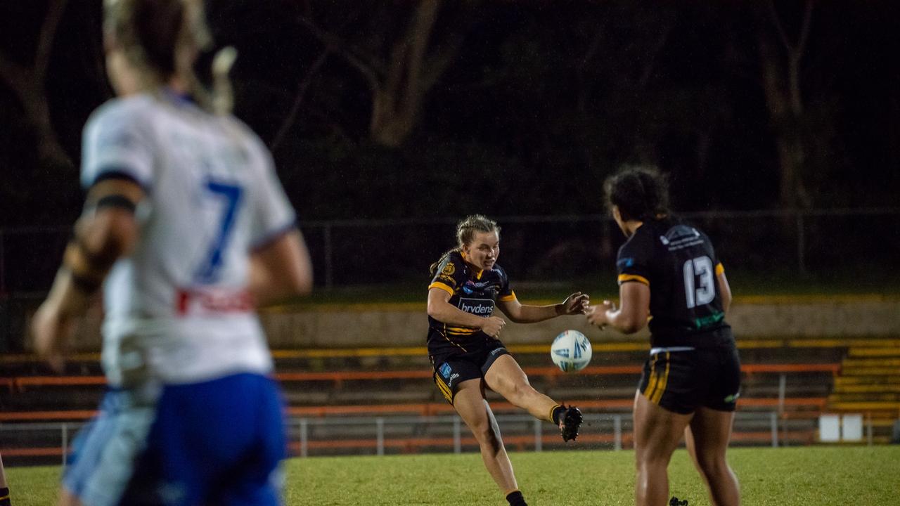 Matilda Power kicks the winning field goal for Mounties. Picture: Thomas Lisson