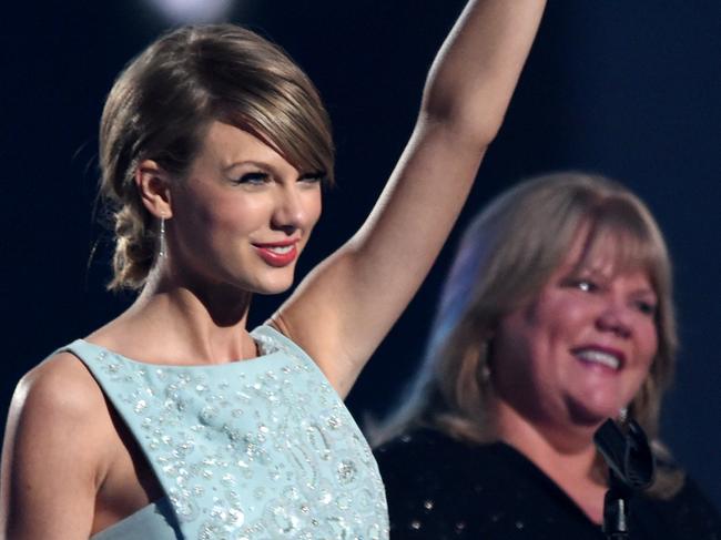 ARLINGTON, TX - APRIL 19: Honoree Taylor Swift accepts the Milestone Award onstage during the 50th Academy Of Country Music Awards at AT&T Stadium on April 19, 2015 in Arlington, Texas. (Photo by Cooper Neill/Getty Images for dcp)