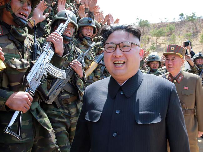 TOPSHOT - This undated picture released from North Korea's official Korean Central News Agency (KCNA) on April 14, 2017 shows North Korean leader Kim Jong-Un (C) inspecting the "Dropping and Target-striking Contest of KPA Special Operation Forces - 2017" at an undisclosed location in North Korea. North Korean leader Kim Jong-Un has overseen a special forces commando operation, state media said on April 13, as tensions soar with Washington over Pyongyang's nuclear programme. / AFP PHOTO / KCNA VIA KNS / STR / South Korea OUT / REPUBLIC OF KOREA OUT   ---EDITORS NOTE--- RESTRICTED TO EDITORIAL USE - MANDATORY CREDIT "AFP PHOTO/KCNA VIA KNS" - NO MARKETING NO ADVERTISING CAMPAIGNS - DISTRIBUTED AS A SERVICE TO CLIENTS THIS PICTURE WAS MADE AVAILABLE BY A THIRD PARTY. AFP CAN NOT INDEPENDENTLY VERIFY THE AUTHENTICITY, LOCATION, DATE AND CONTENT OF THIS IMAGE. THIS PHOTO IS DISTRIBUTED EXACTLY AS RECEIVED BY AFP.  /