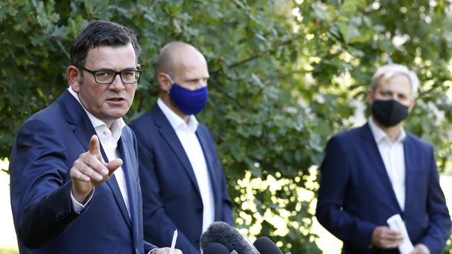 Daniel Andrews announces the lifting of lockdown, with Testing Commander Jeroen Weimar and Chief Health Officer Brett Sutton. Picture: Getty Images