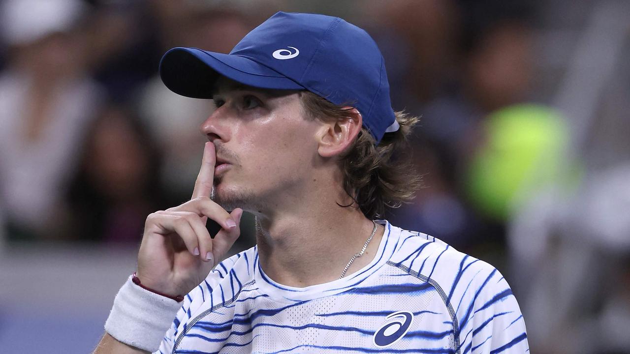 Alex de Minaur of Australia motions to the crowd to stop booing against Daniel Evans of Great Britain for losingduring their Men's Singles Third Round match on Day Six of the 2024 US Open at USTA Billie Jean King National Tennis Center. Matthew Stockman/Getty Images/AFP.