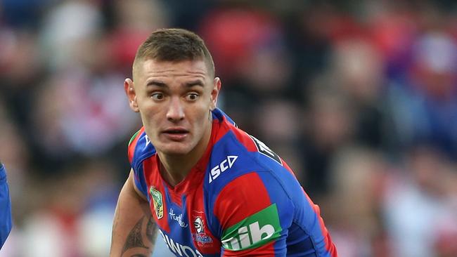 NEWCASTLE, AUSTRALIA - JUNE 25: Danny Levi of the Knights looks to pass the ball during the round 16 NRL match between the Newcastle Knights and the St George Illawarra Dragons at Hunter Stadium on June 2