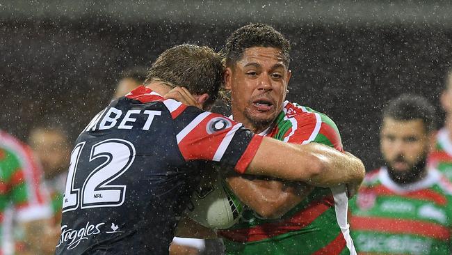 Dane Gagai of the Rabbitohs is tackled by Mitchell Aubusson of the Roosters during the Round 1 NRL match between the Sydney Roosters and the South Sydney Rabbitohs at the Sydney Cricket Ground in Sydney, Friday, March 15, 2019. (AAP Image/Dan Himbrechts) NO ARCHIVING, EDITORIAL USE ONLY