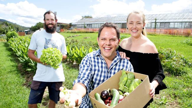 The farmer at Millen Farm, Arran Heideman, with Alastair and Ashleigh McLeod. Picture: AAP/Ric Frearson.