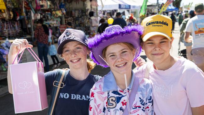 Fairholme College year 7 boarders (from left) Chelsey Crump, Ruby Lucht and Grace Miller having fun at the Toowoomba Royal Show, Friday, April 19, 2024. Picture: Kevin Farmer