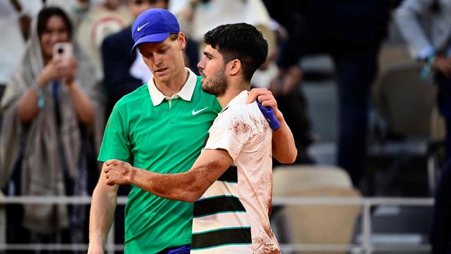 Long live the Jannik Sinner and Carlos Alcaraz rivalry. (Photo by JULIEN DE ROSA / AFP)