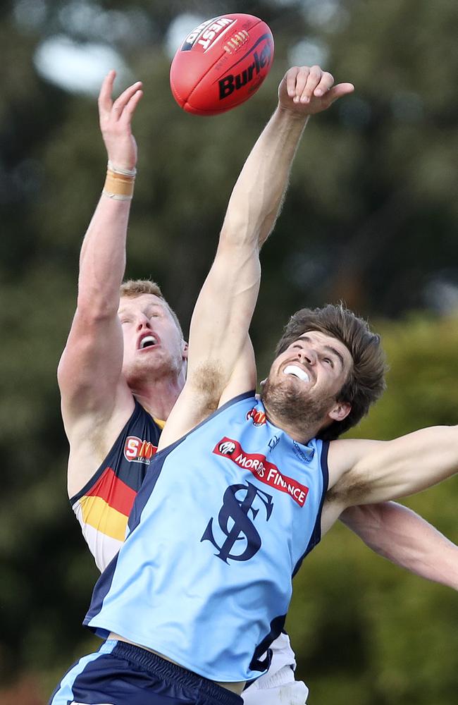 Sturt’s Thomas Read battles Adelaide’s Reilly O'Brien. Picture: SARAH REED