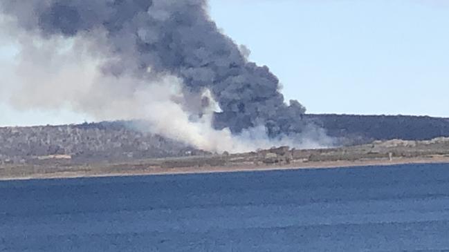 A bushfire at Tods Corner in the Central Highlands, near Miena, late last month. Picture: KAROLIN MACGREGOR