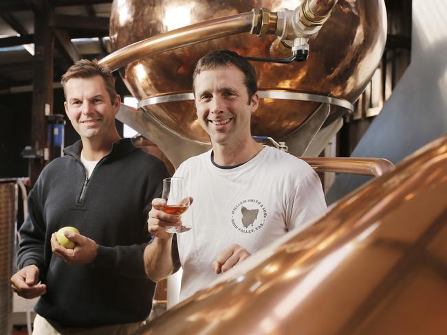 Andrew Smith, left, with head cider maker and distiller Tim Jones in their distillery in Grove. Picture: MATHEW FARRELL