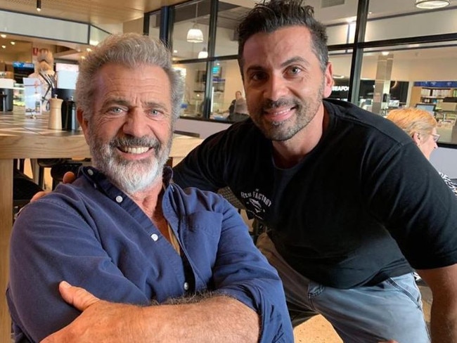 Mel Gibson at The Fish Factory at Morningside with owner Chris Savva.