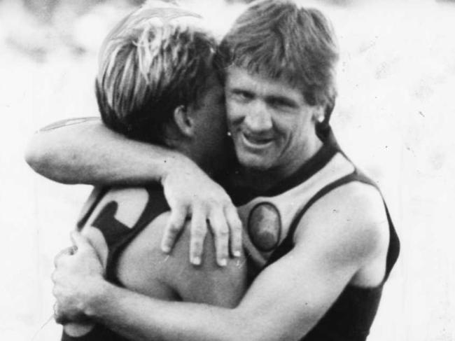 Footballer Chris McDermott (r) with Scott Salisbury.SANFL football - Glenelg match 25 Sep 1988. a/ct