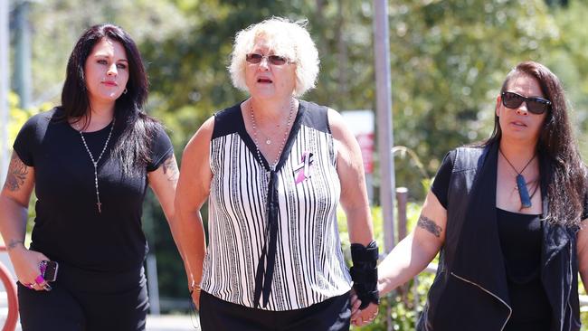 Charli Darragh, centre, arrives at court for her mother’s murder trial with the victim’s granddaughters Sasha Tahana and Shannon Parkinson. Photo: Jason O'Brien