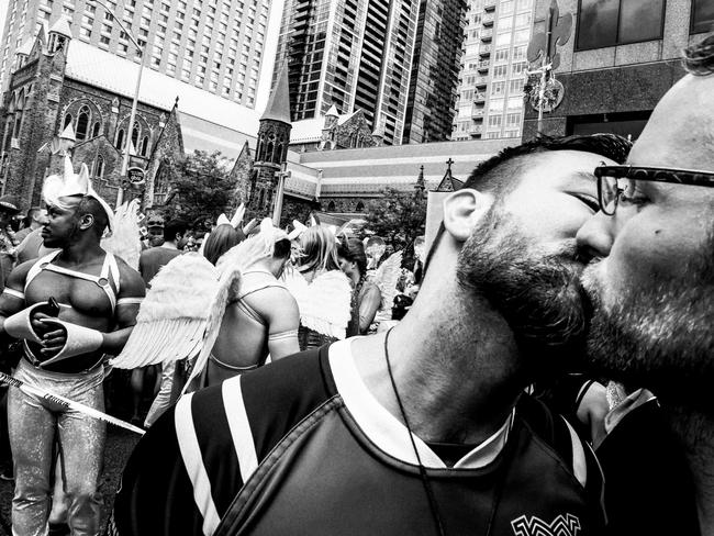Sports - First Prize, Stories © Giovanni Capriotti Title: Boys Will be Boys Muddy York Rugby Football Club player Jean Paul Markides (left) kisses his partner and teammate Kasimir Kosakowski during the pride parade on Sunday, 3 July 2016, in Toronto, Ontario. Discomfort in the locker room pushed a few of Toronto’s gay rugby players to form the city’s first gay-friendly rugby team. Established in 2003, Muddy York RFC primarily competes against “straight” teams in the Toronto Rugby Union. The Muddy York team unconsciously started the process of describing and deconstructing the idea of performance within masculinity.