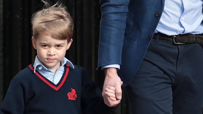 Prince George today, meeting his baby brother for the first time. Picture: AFP