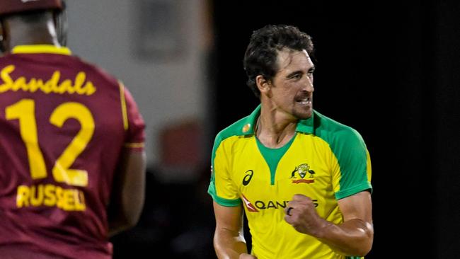 Mitchell Starc celebrates as Australia romped to a massive win in the ODI opener against the West Indies. (Photo by Randy Brooks / AFP)