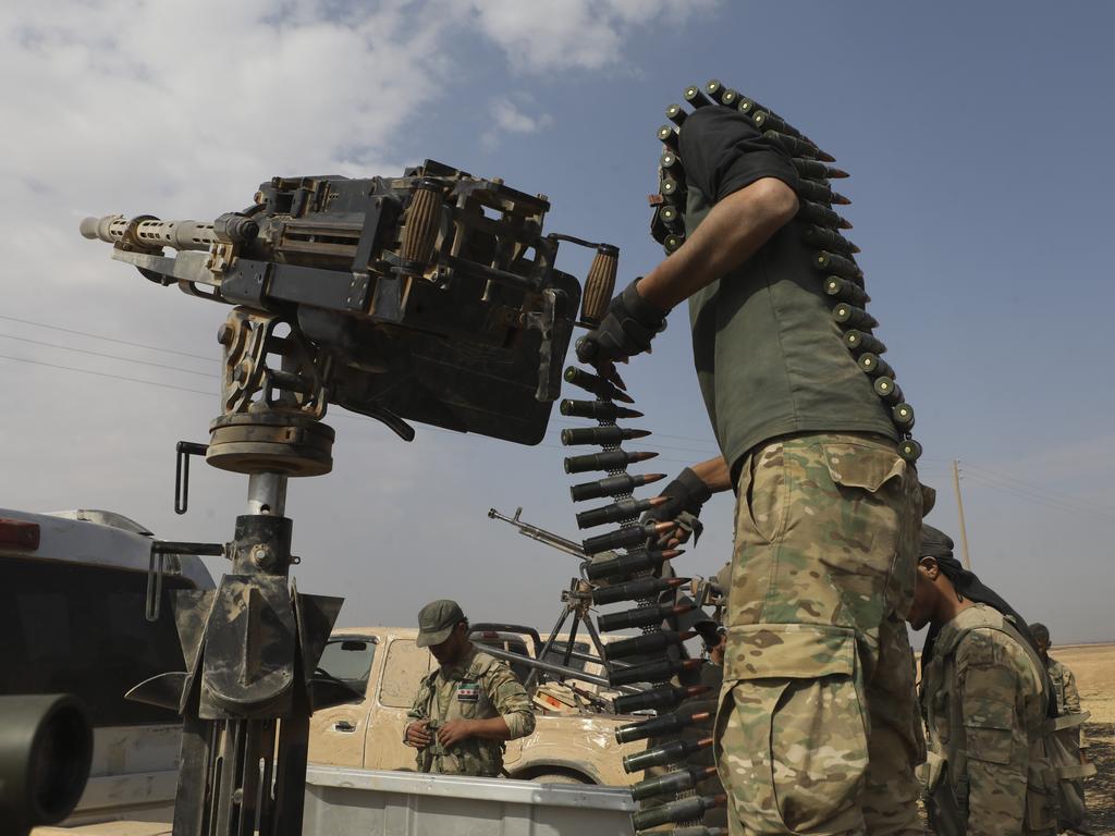 Fighting between Turkey and Kurdish forces continued Friday in Ras al-Ayn despite a US-brokered ceasefire that went into effect overnight. Picture: AP Photo