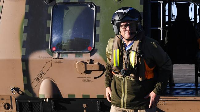 Scott Morrison on a tour of flood-ravaged northwestern Sydney before fronting parliament to say he ‘understood the pain so many Australians are feeling’. Picture: AAP