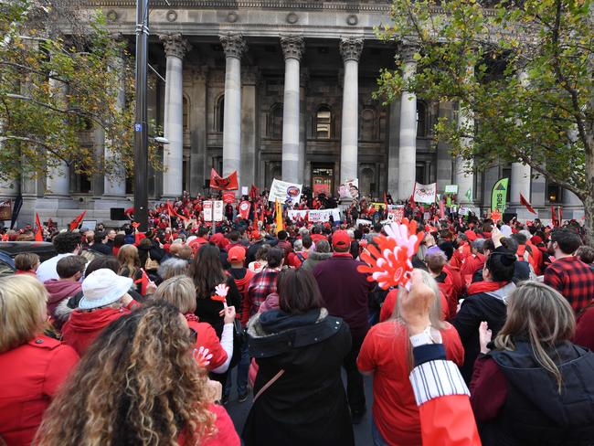 Public teachers from across South Australia rally on the steps of Parliament House. Picture: AAP / Mark Brake