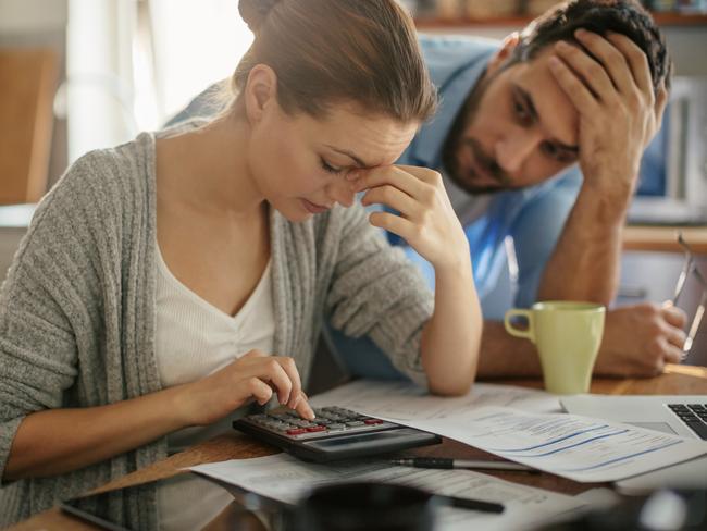 Photo of a couple going through  financials problems