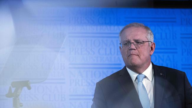 Camera flashes lit up the stage as Prime Minister Scott Morrison used his pre-budget address to outline his government’s strategy to develop a modern manufacturing sector. Picture: NCA NewsWire / Gary Ramage