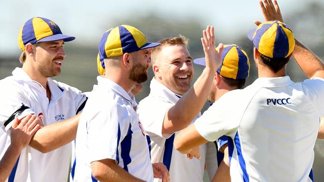 Pascoe Vale Central players celebrate taking a wicket. (Photo by Josh Chadwick)