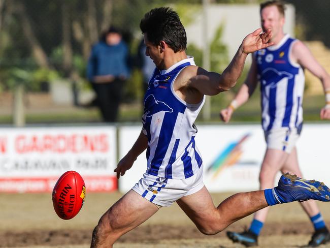 Mark Baguley boots Langwarrin into attack. Picture: Al Dillon