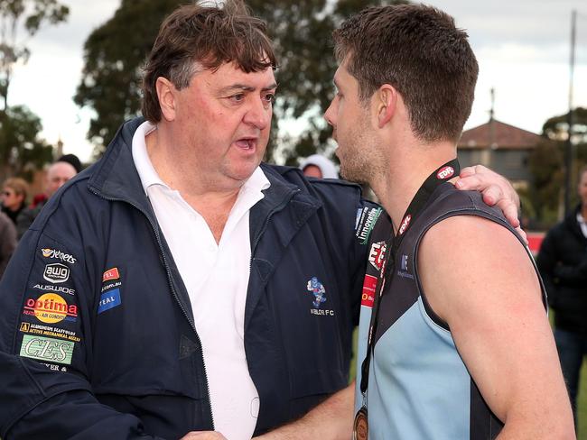 Mick McGuane congratulates Aberfeldie star Luke Blackwell after last year’s EDFL grand final. Picture: Mark Dadswell