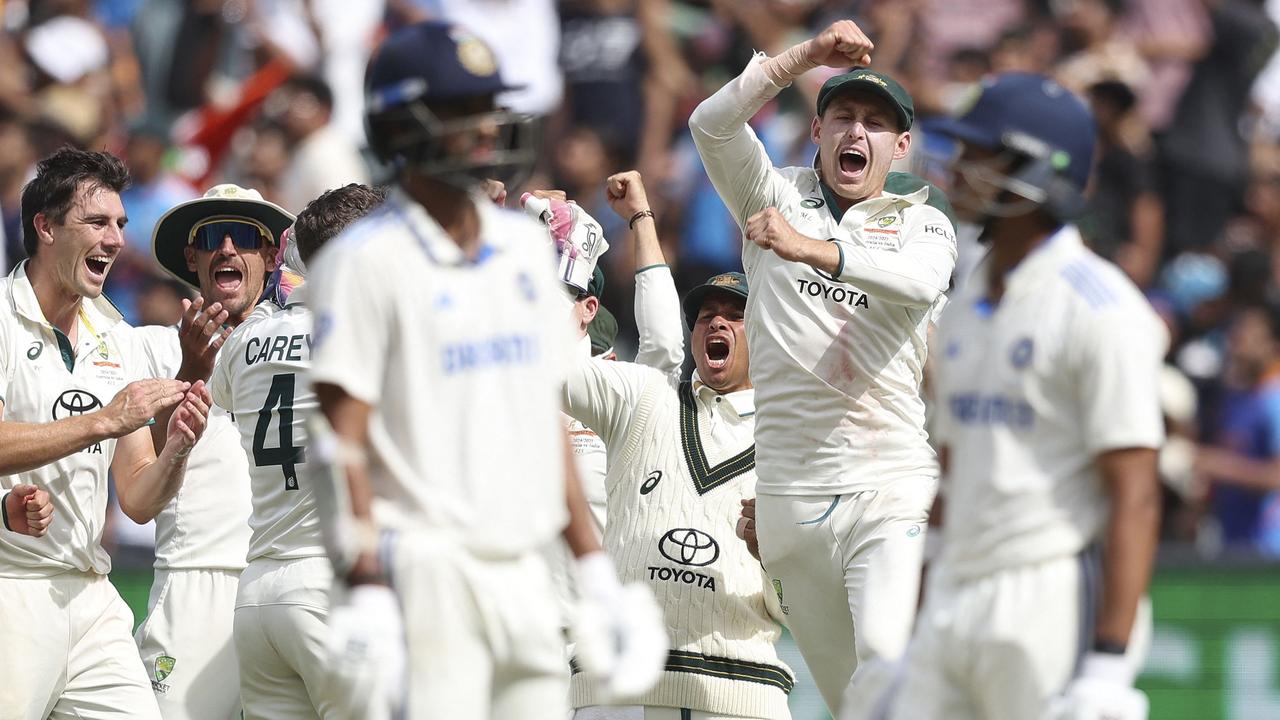 Australian players celebrate to a DRS decision that dismisses Yashasvi Jaiswal on day five of the fourth cricket Test match between Australia and India. (Photo by Martin KEEP / AFP)