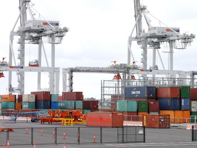 Containers stacked up high at Webb Dock unable to leave because of an industrial dispute    .Pic: Michael Klein