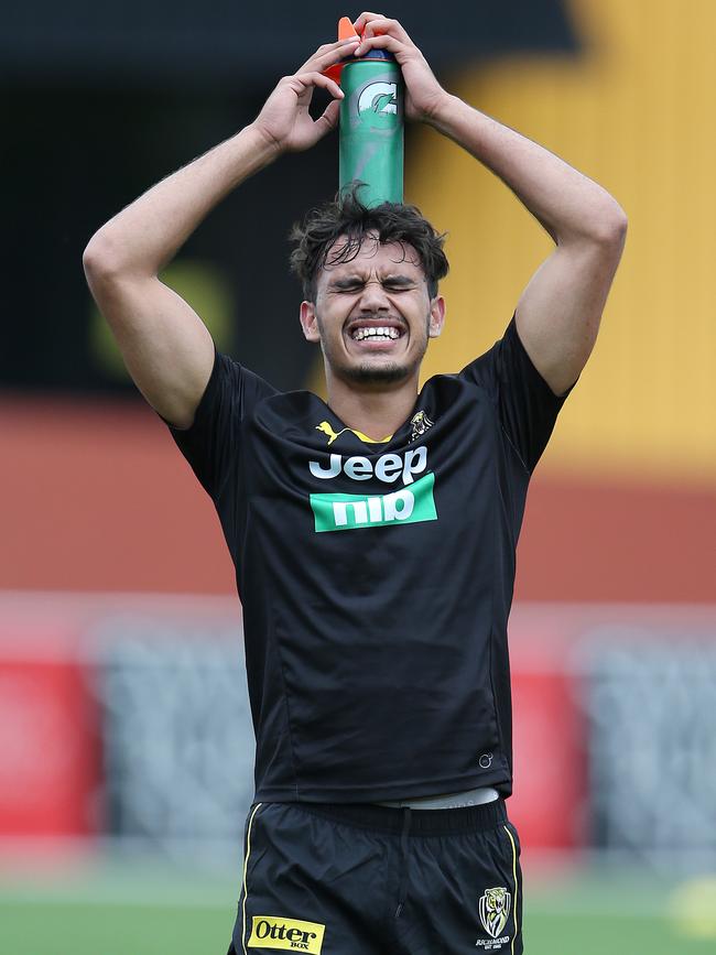 Sydney Stack feels the pinch at Richmond training. Picture: Michael Klein