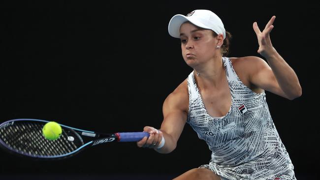 Ash Barty plays a forehand volley during her win over Camila Giorgia