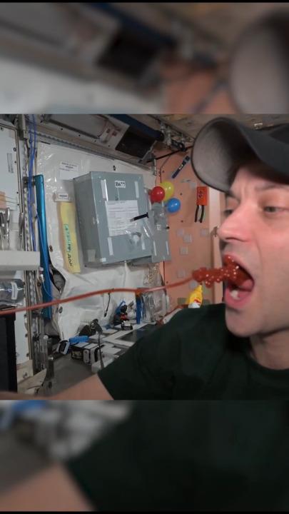 Astronaut shows how to eat ketchup at zero gravity