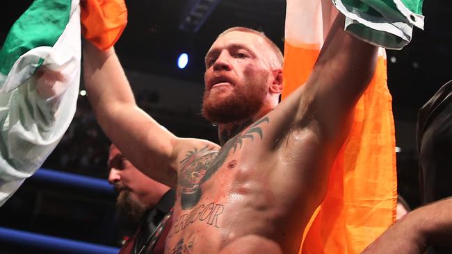 Conor McGregor celebrates after defeating Nate Diaz.